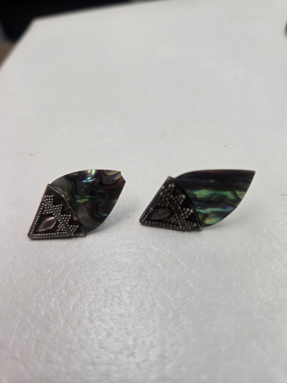 vintage Sterling Silver Mexican stud earrings featuring triangular abalone shell
